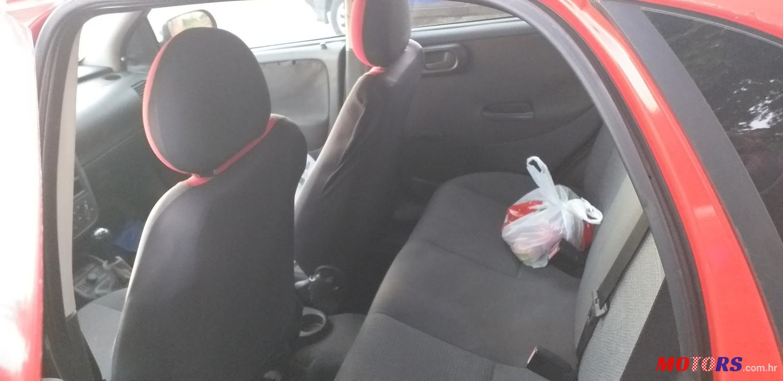 2004' Opel Corsa photo #5