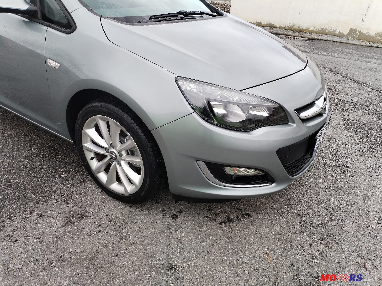 2013' Opel Astra Karavan photo #2