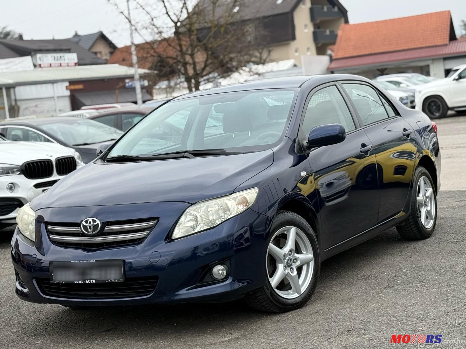 2009' Toyota Corolla Sedan photo #2