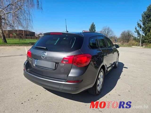 2012' Opel Astra Karavan photo #6