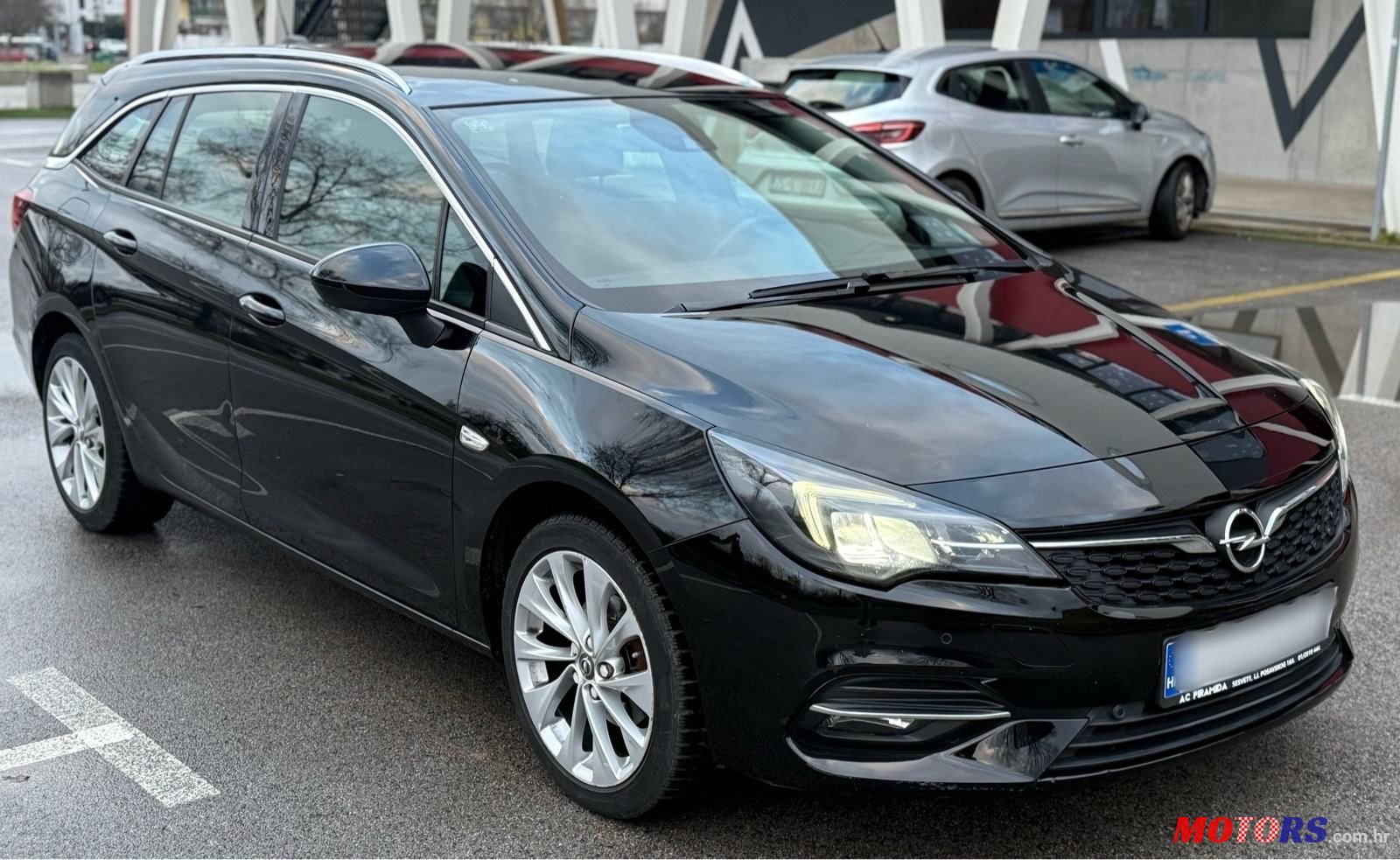 2021' Opel Astra Karavan photo #1