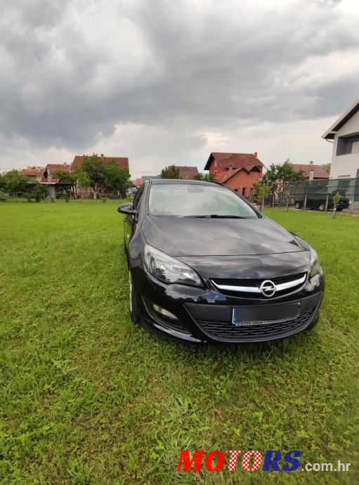 2015' Opel Astra Karavan photo #1