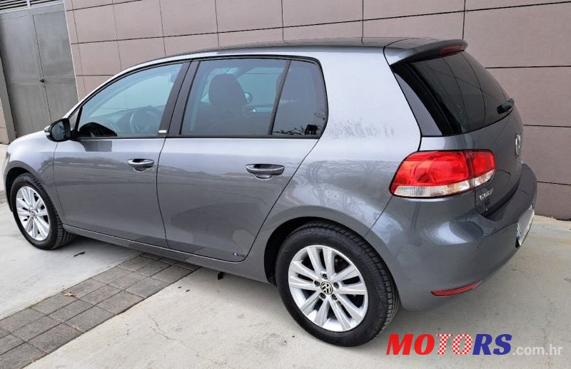 2011' Volkswagen Golf VI 1,6 Tdi photo #3