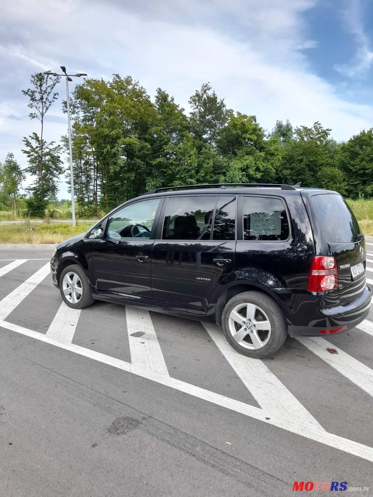 2009' Volkswagen Touran photo #4