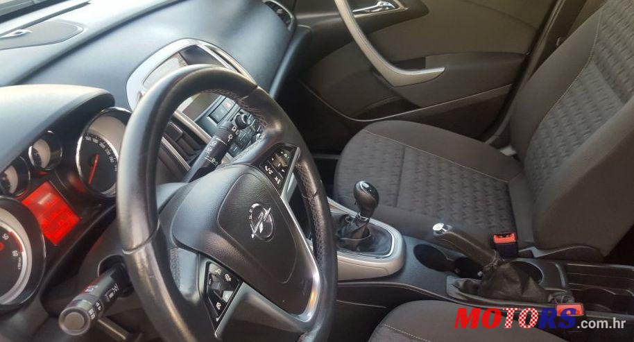 2014' Opel Astra Karavan photo #1