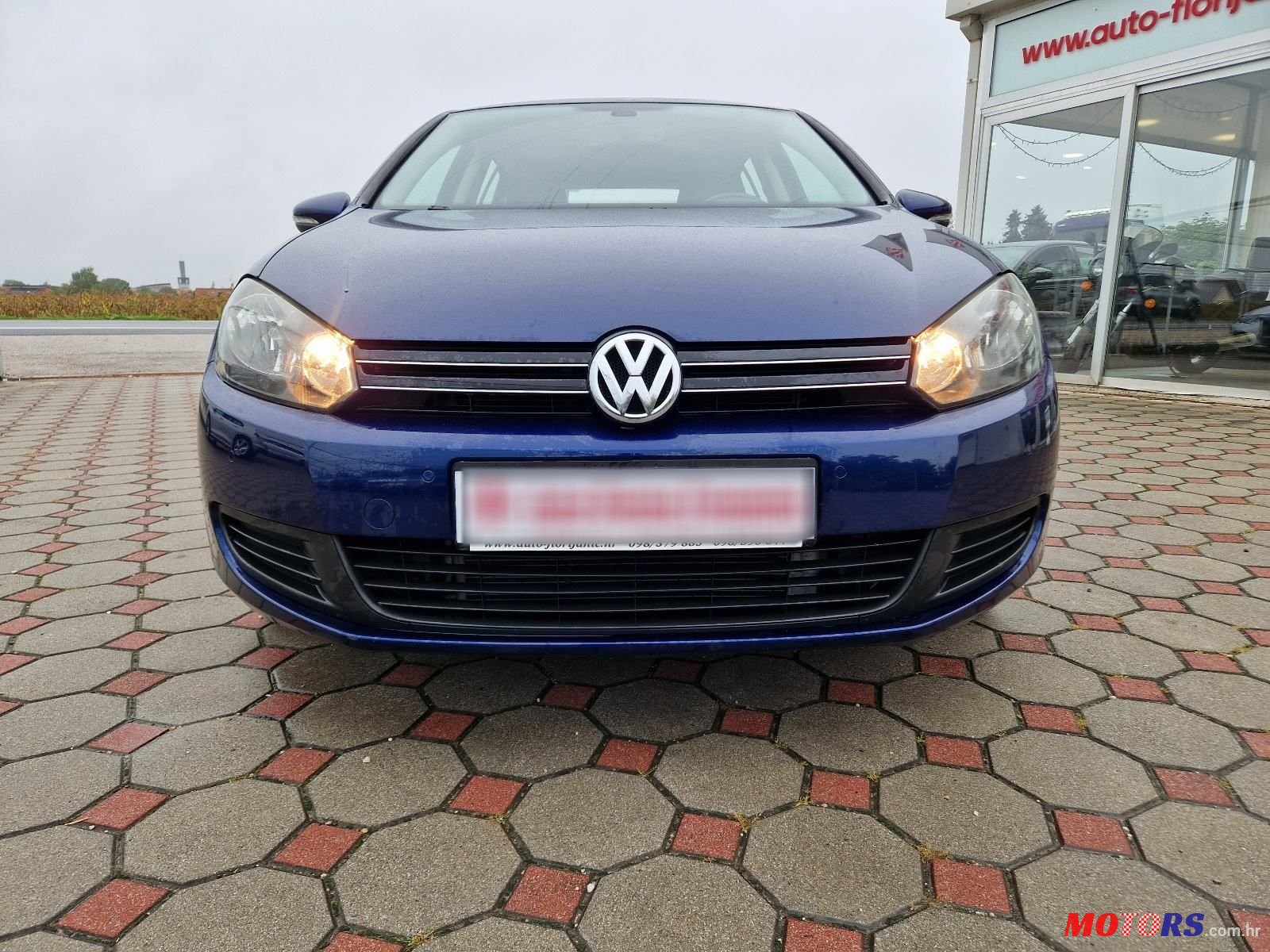 2009' Volkswagen Golf VI 1,6 Tdi photo #2