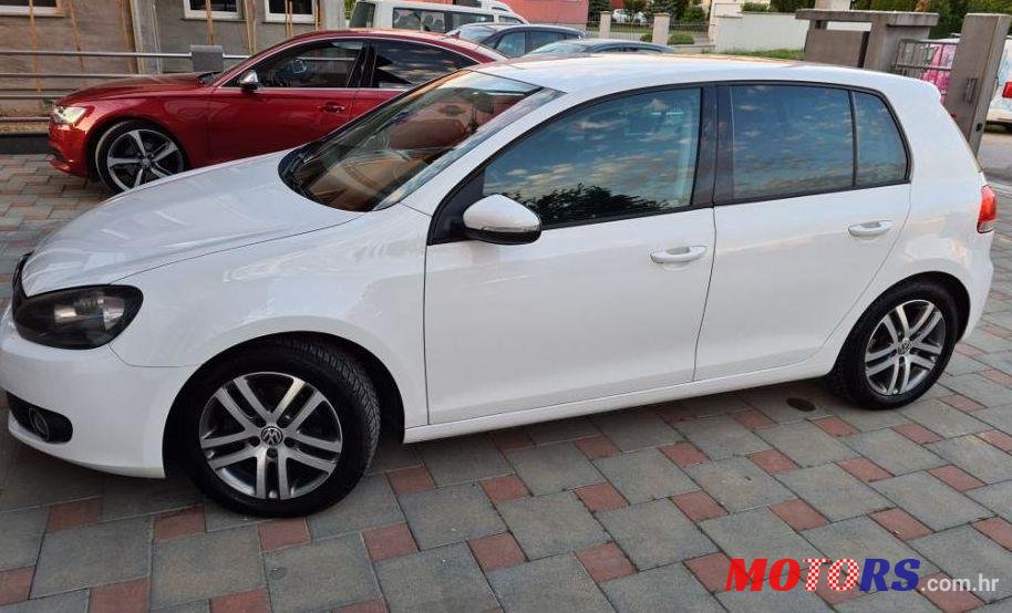 2012' Volkswagen Golf VI 1,6 Tdi photo #1