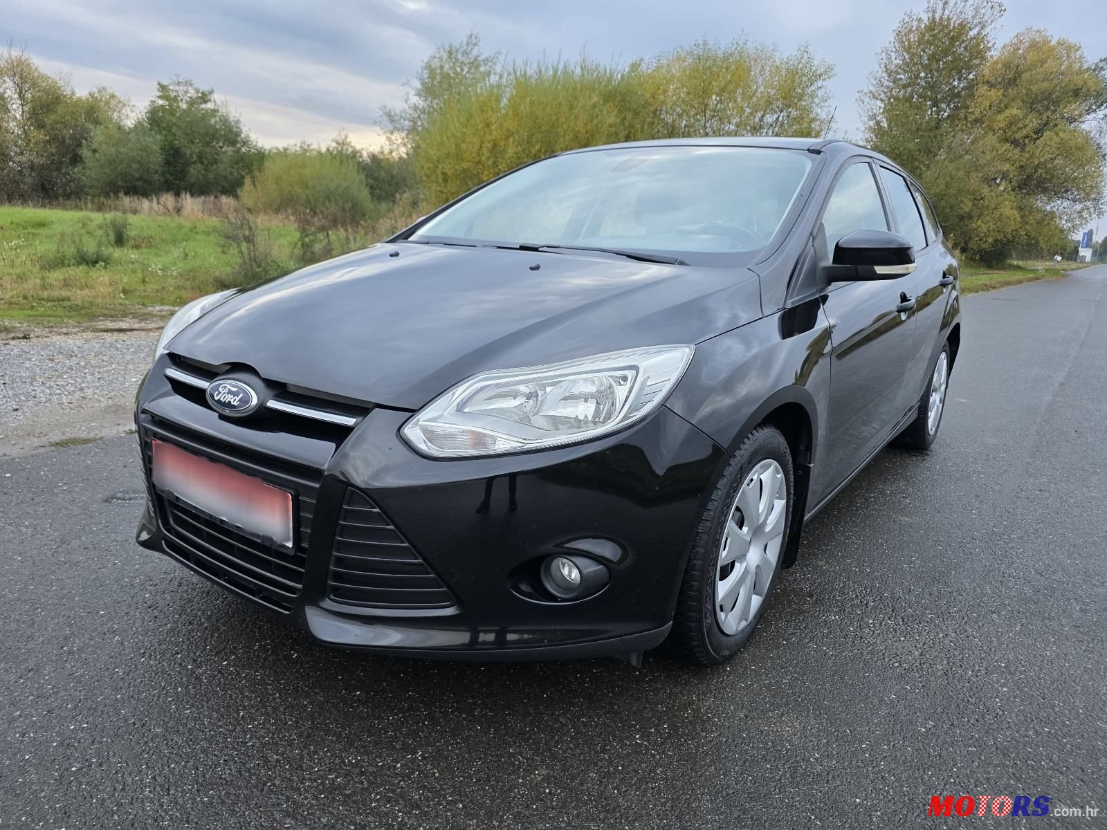 2011' Ford Focus 1,6 photo #1