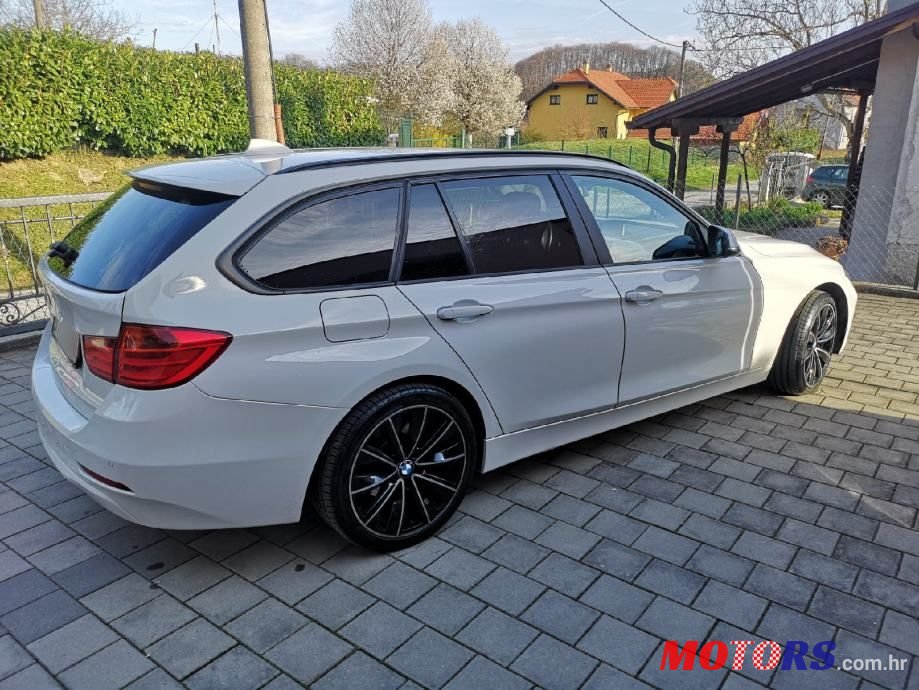 2014' BMW Serija 3 318D photo #1