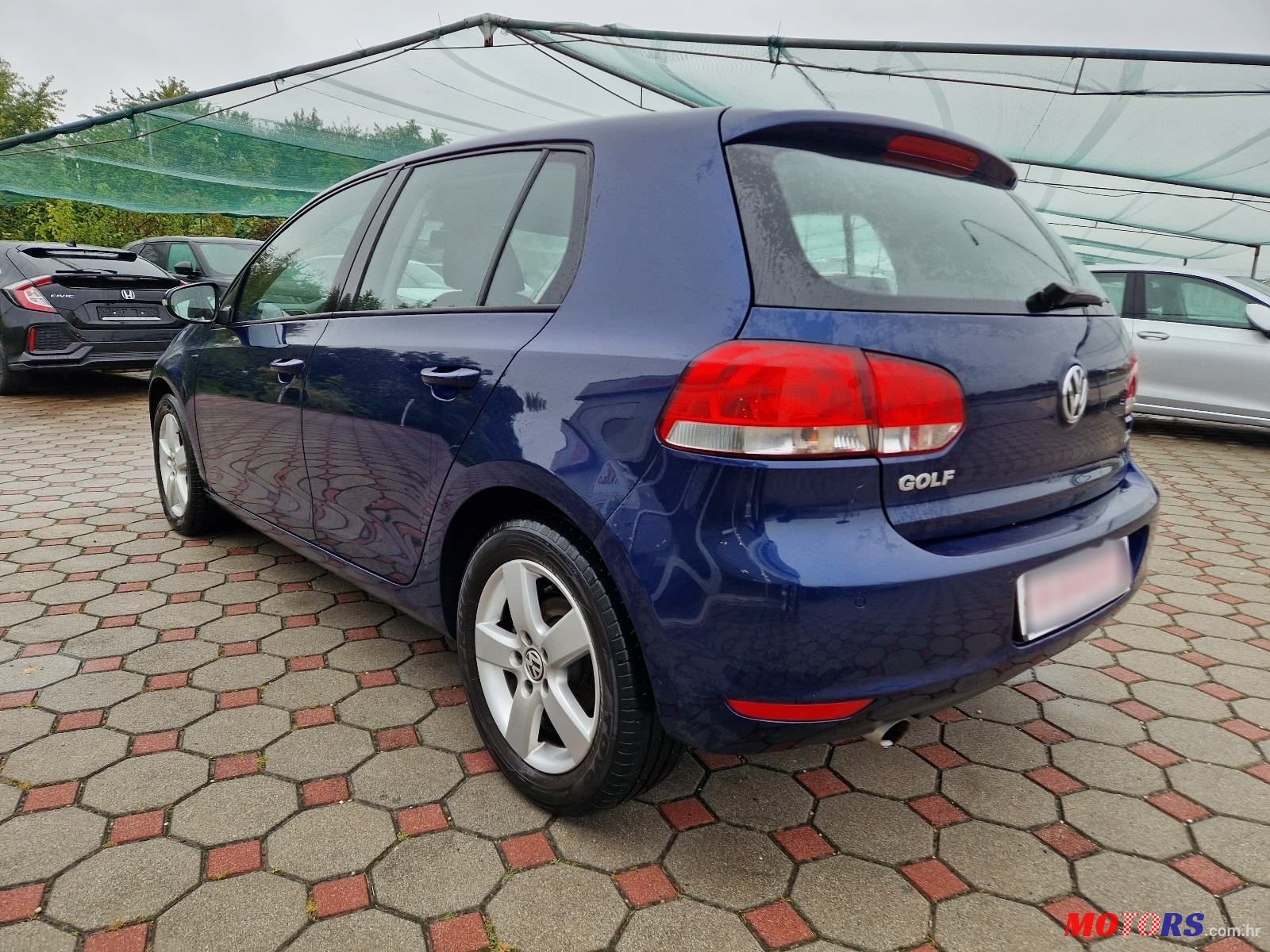 2009' Volkswagen Golf VI 1,6 Tdi photo #5