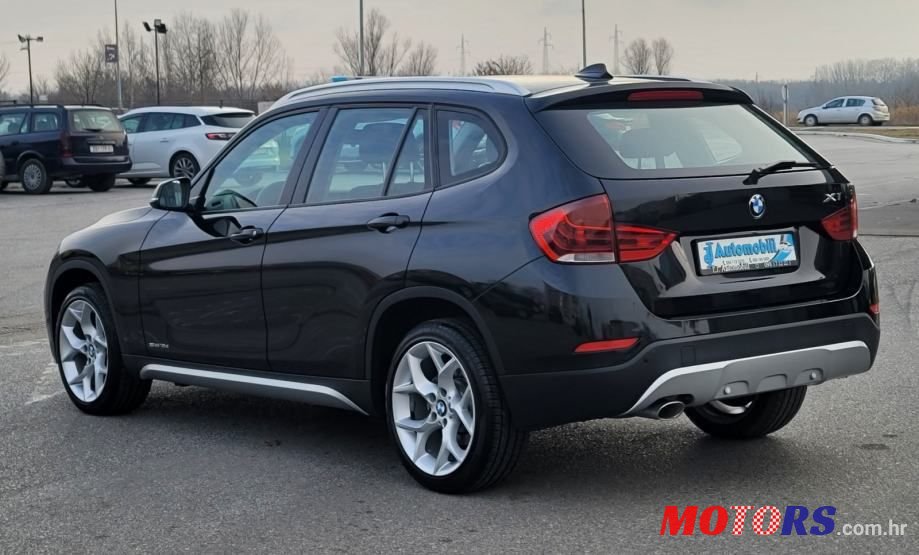 2014' BMW X1 Sdrive18D photo #6