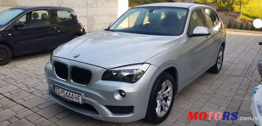 2013' BMW X1 Sdrive18D photo #1