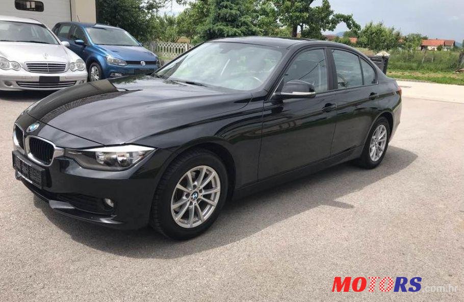 2014' BMW Serija 3 318D photo #1