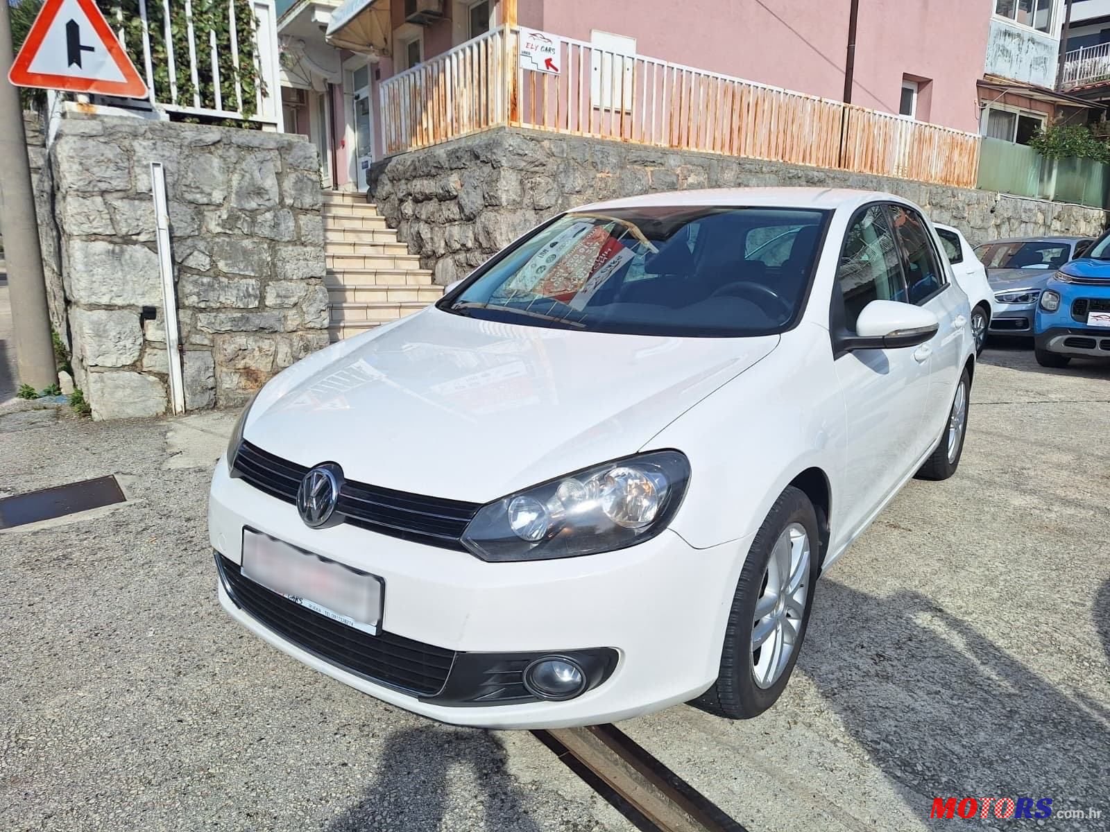 2011' Volkswagen Golf VI 1,6 Tdi photo #2