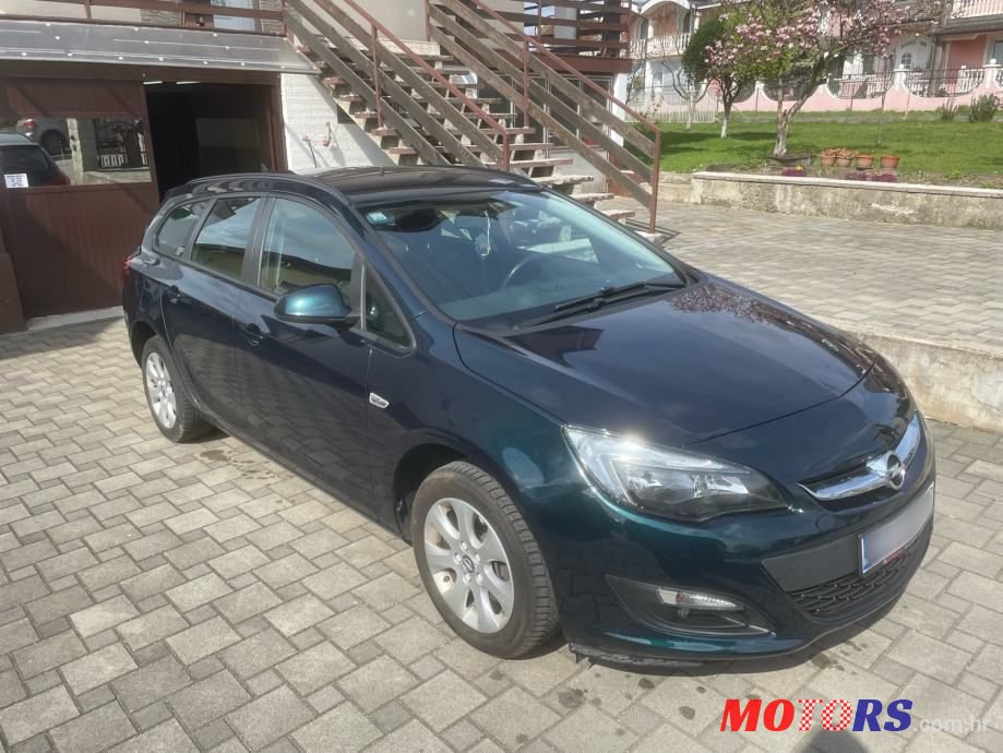 2015' Opel Astra Karavan photo #2