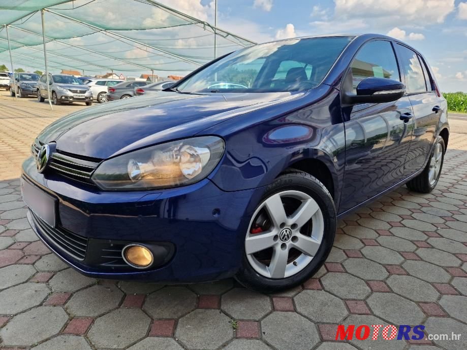 2011' Volkswagen Golf VI 1,6 Tdi photo #1