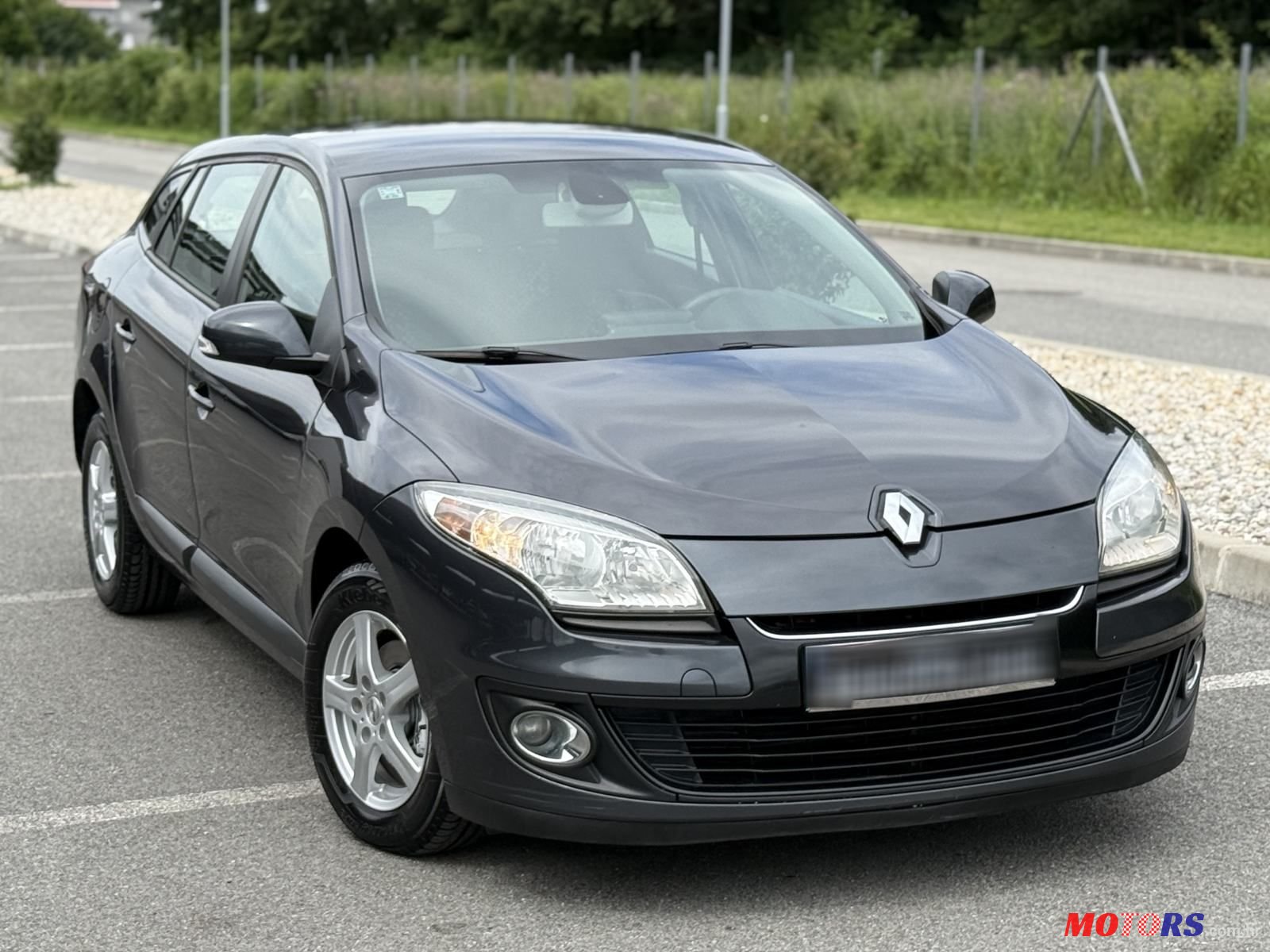 2012' Renault Megane Grandtour photo #1