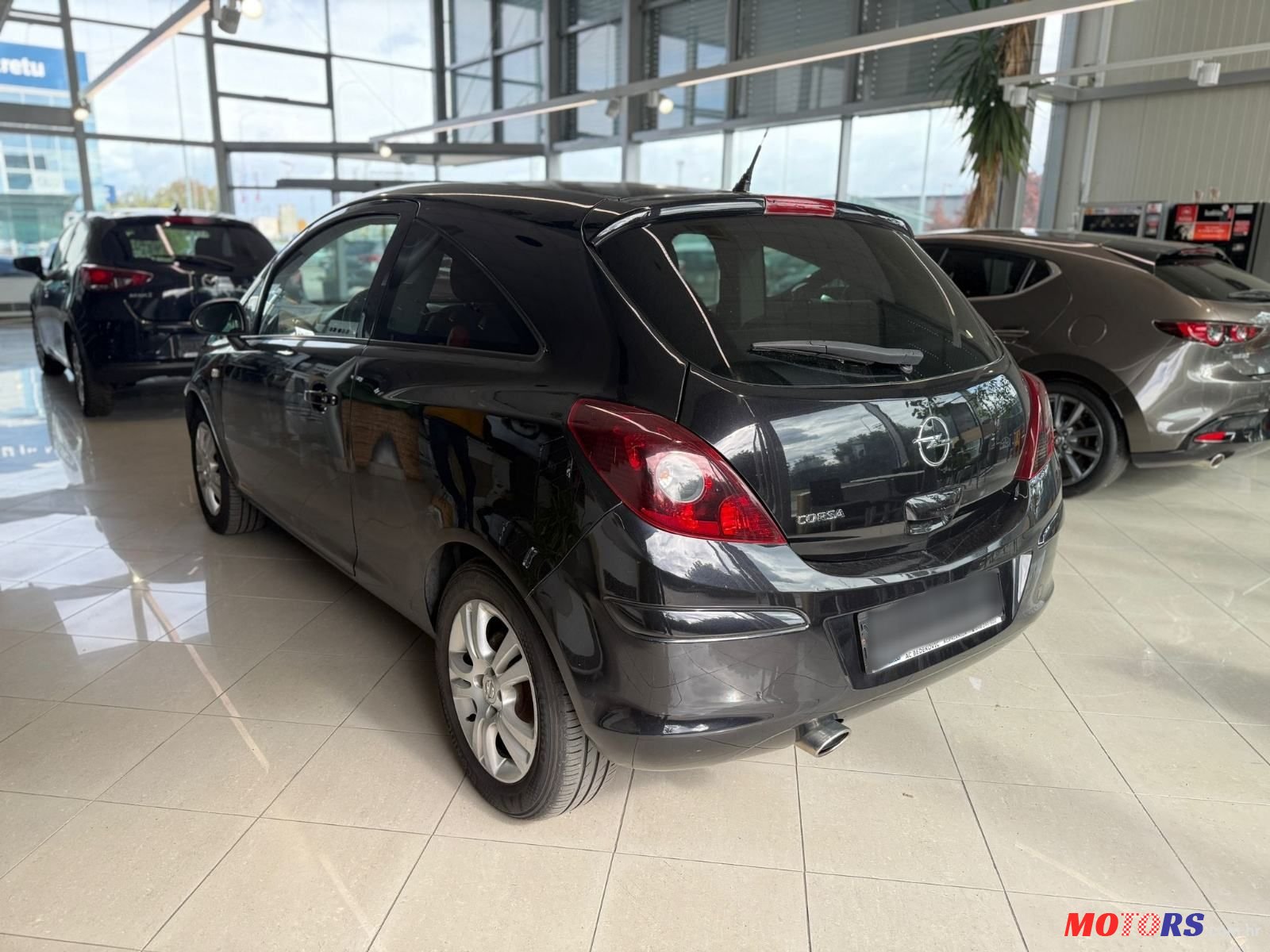 2010' Opel Corsa 1.4 Color Edition photo #5