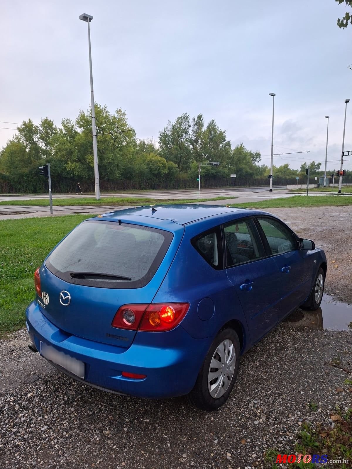 2004' Mazda 3 Sport 1,4 I Ce photo #5