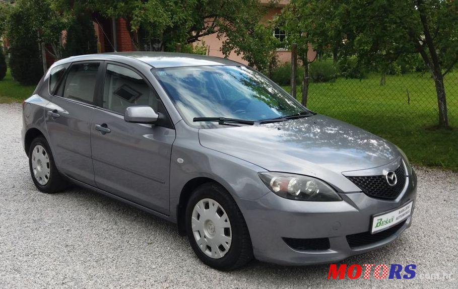 2004' Mazda 3 Sport 1,4 I Ce photo #1