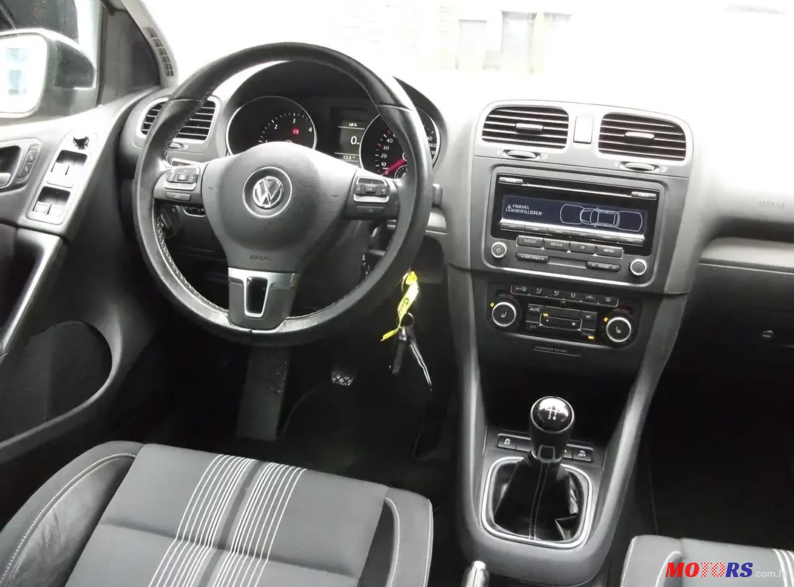 2012' Volkswagen Golf VI 1,6 Tdi photo #5