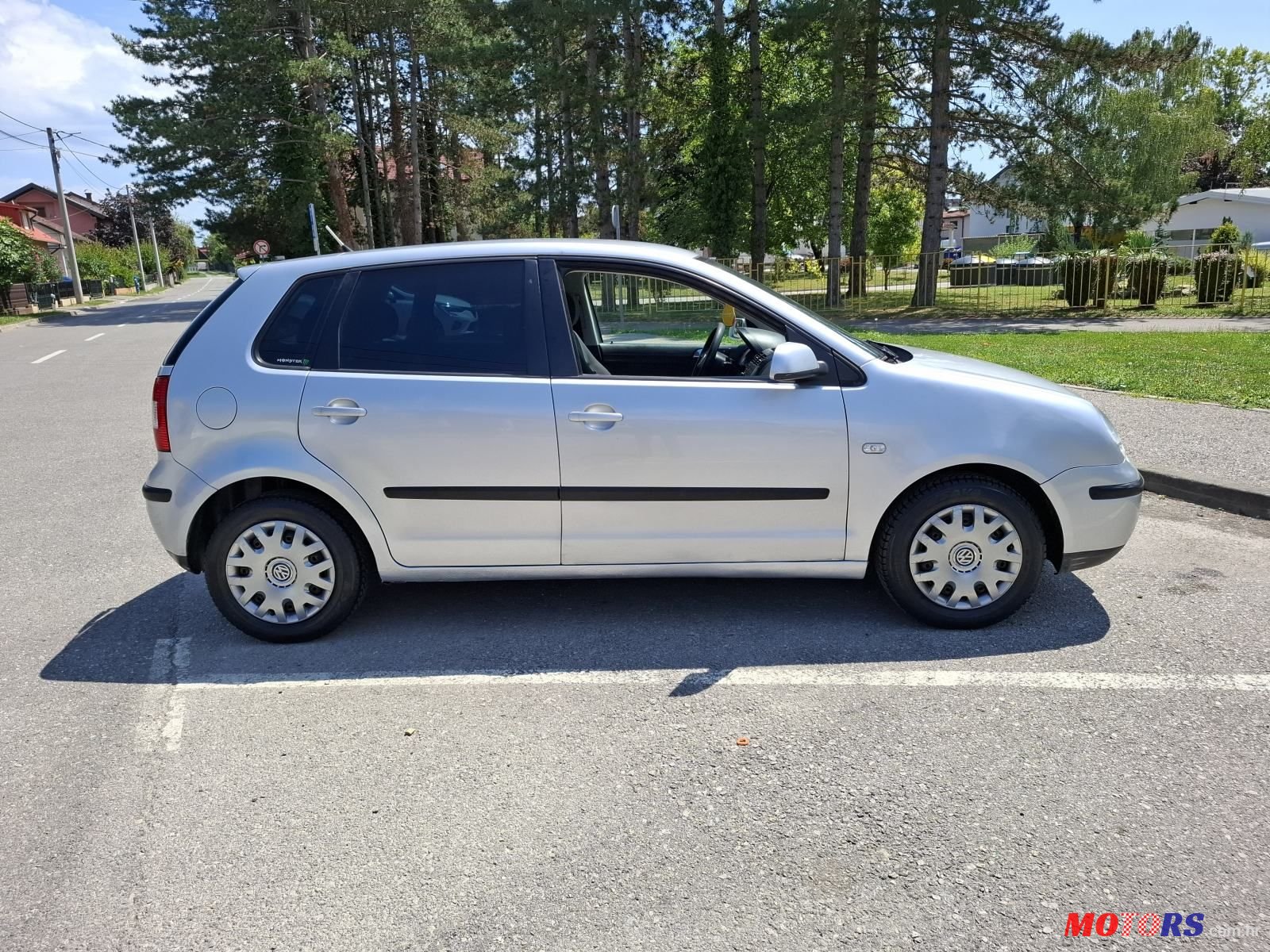 2004' Volkswagen Polo photo #1