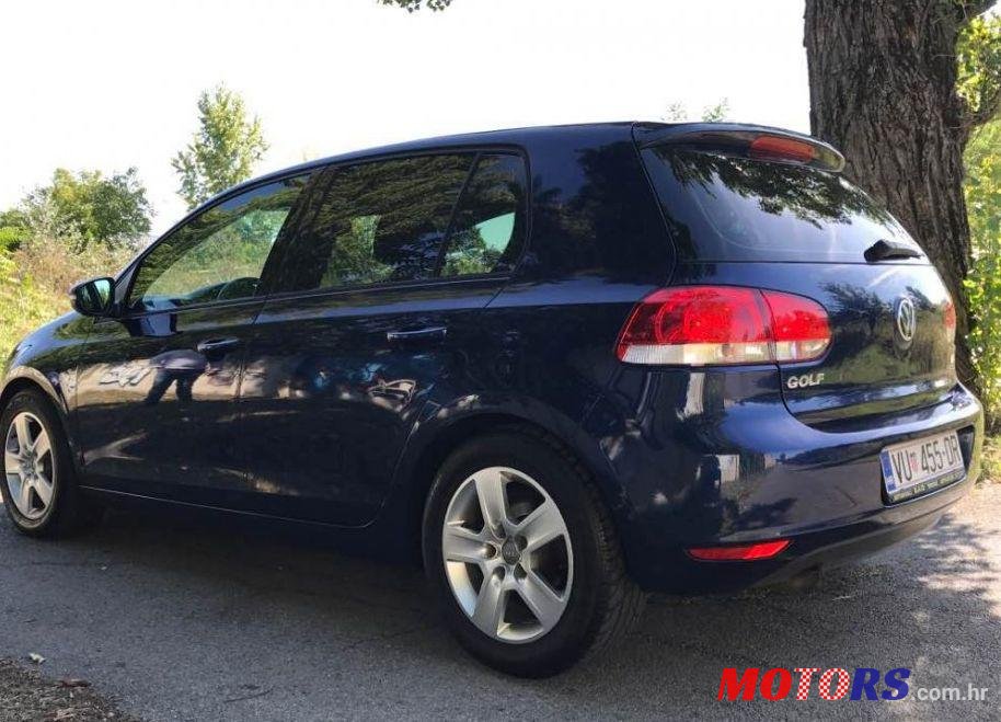 2011' Volkswagen Golf VI 1,6 Tdi photo #1