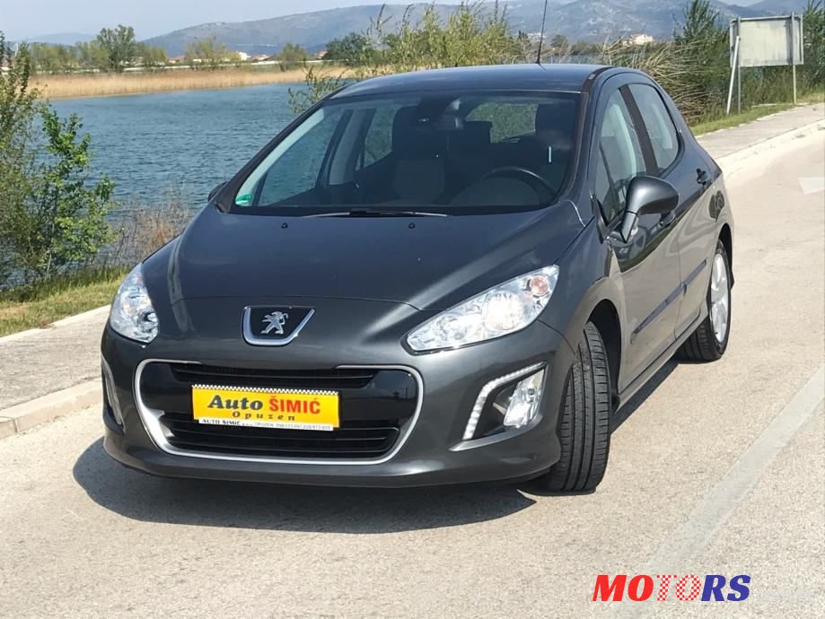 2012' Peugeot 308 photo #1