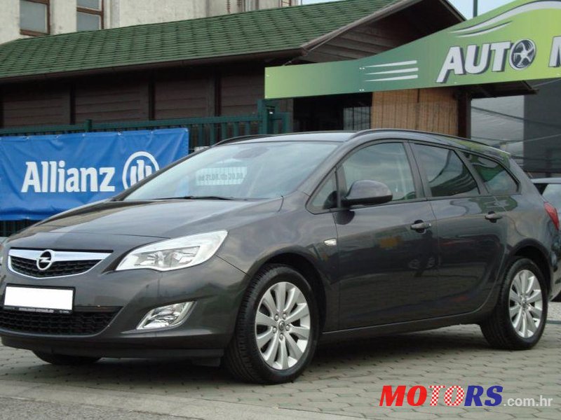 2011' Opel Astra Karavan photo #1