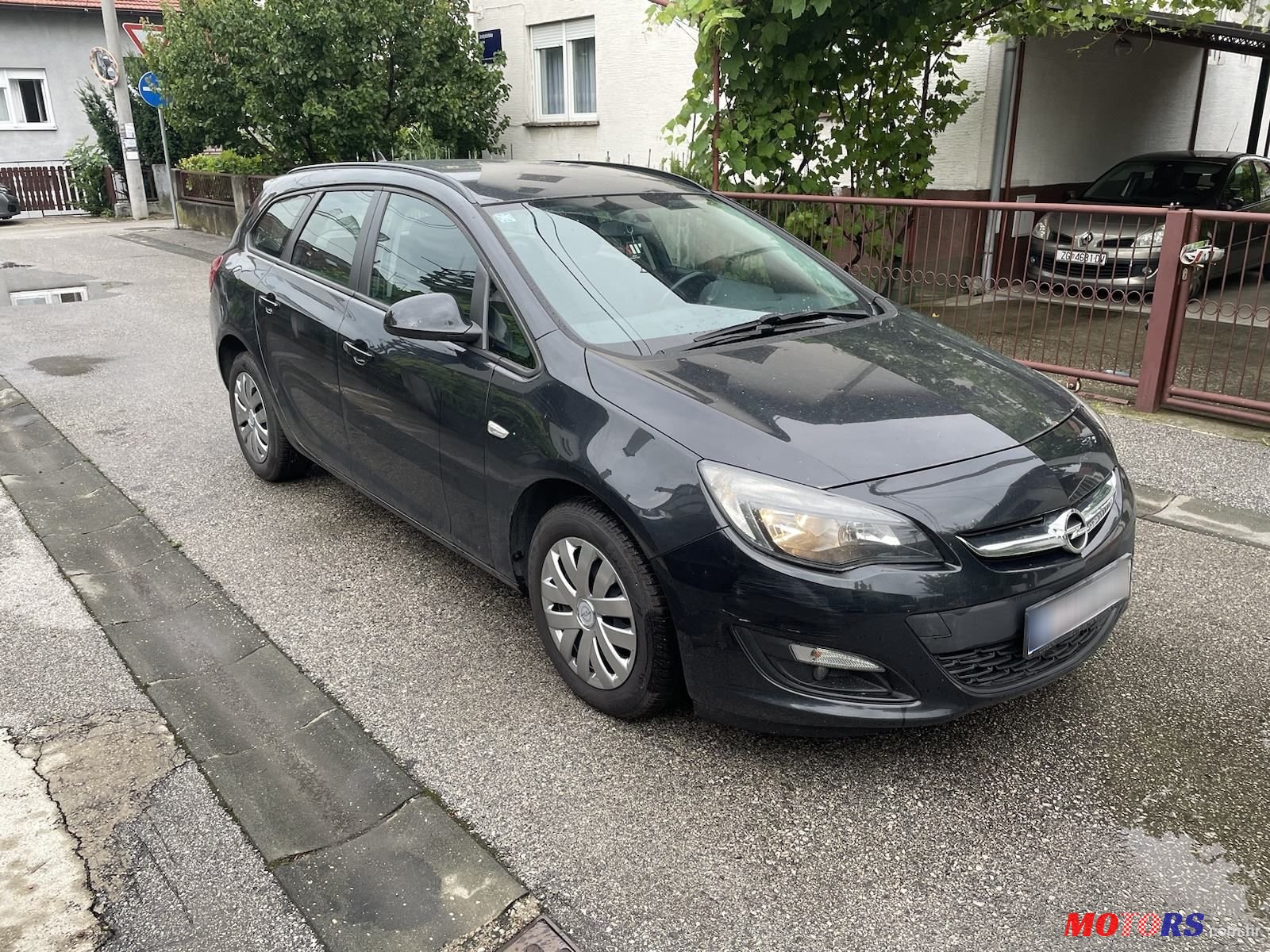 2014' Opel Astra Karavan photo #2