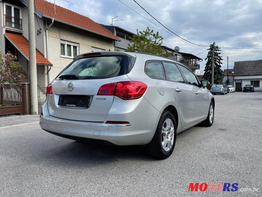 2014' Opel Astra Karavan photo #2