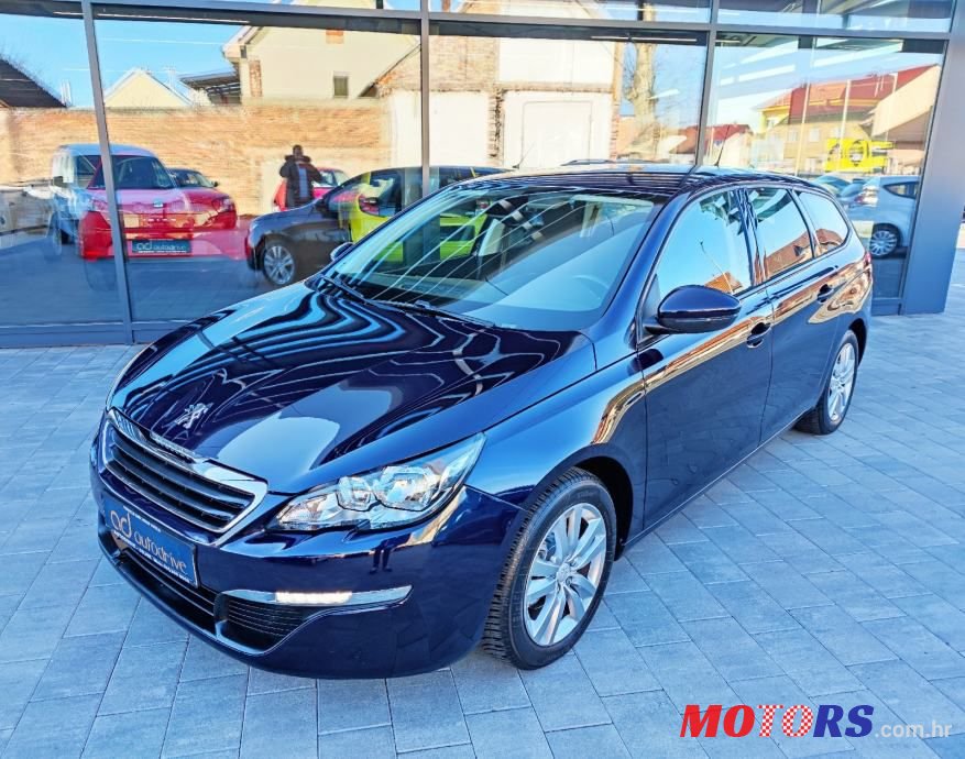 2014' Peugeot 308 Sw photo #1