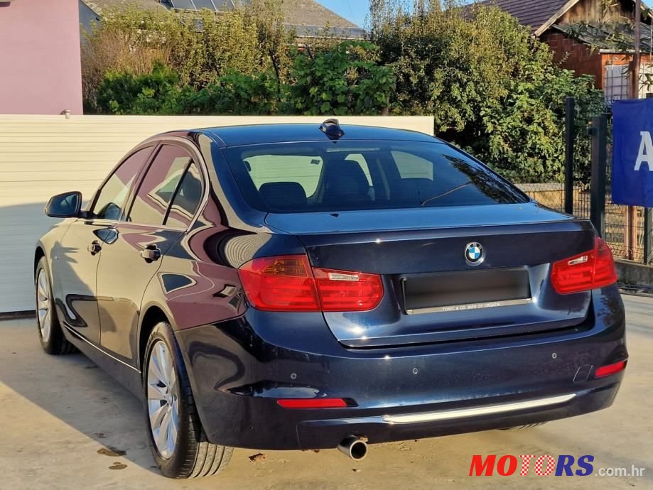 2014' BMW Serija 3 318D photo #4