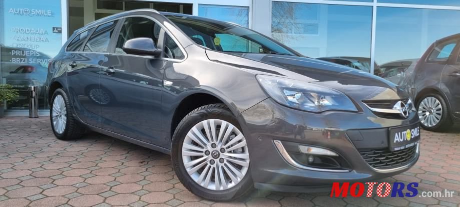 2014' Opel Astra Karavan photo #2