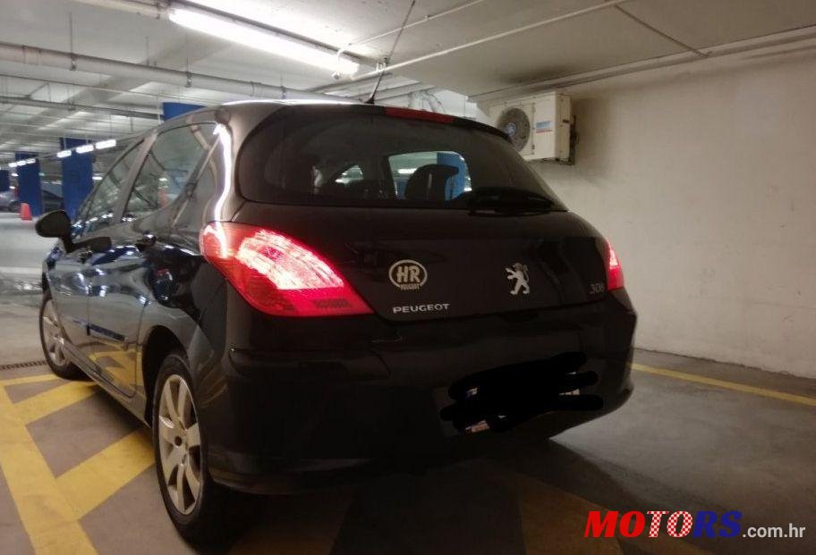 2009' Peugeot 308 1,4 16V Vti photo #1