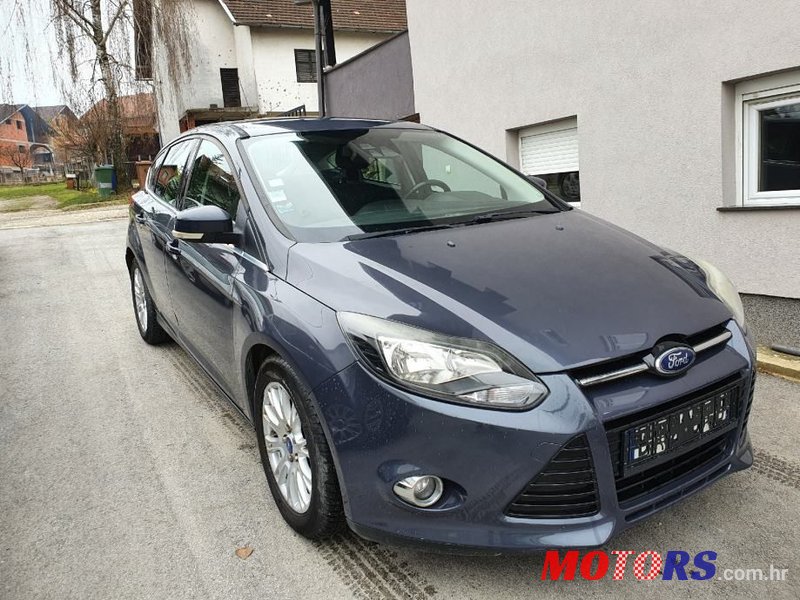 2011' Ford Focus 1,6 photo #1