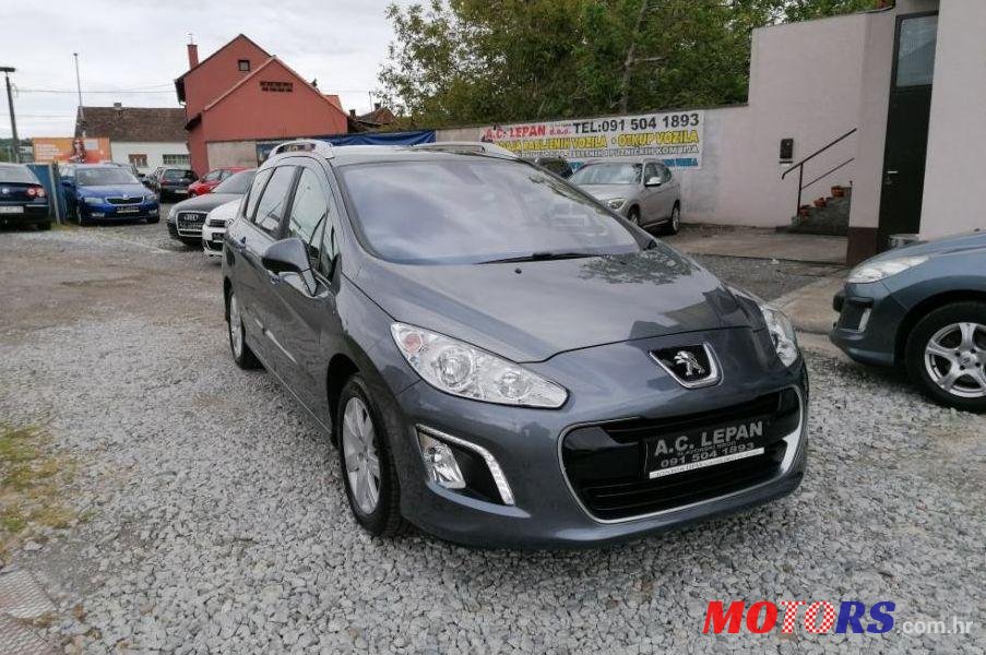 2011' Peugeot 308 Sw photo #1