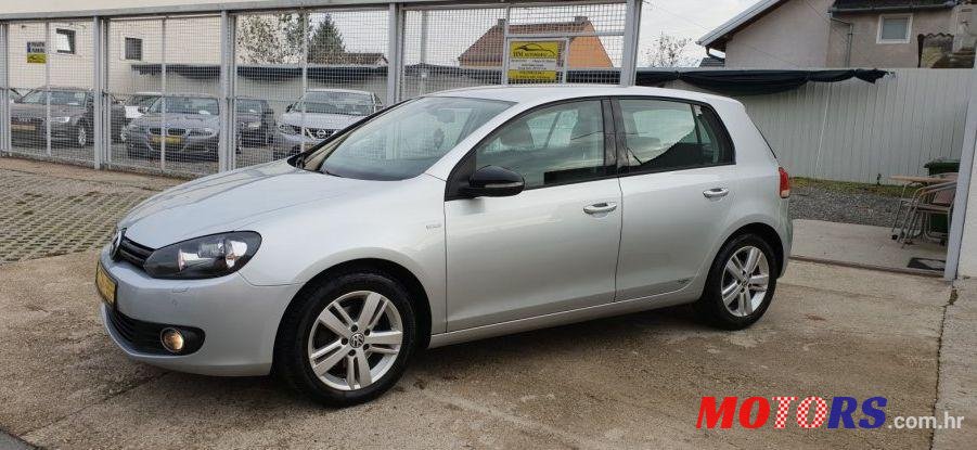2012' Volkswagen Golf VI 1,6 Tdi photo #1