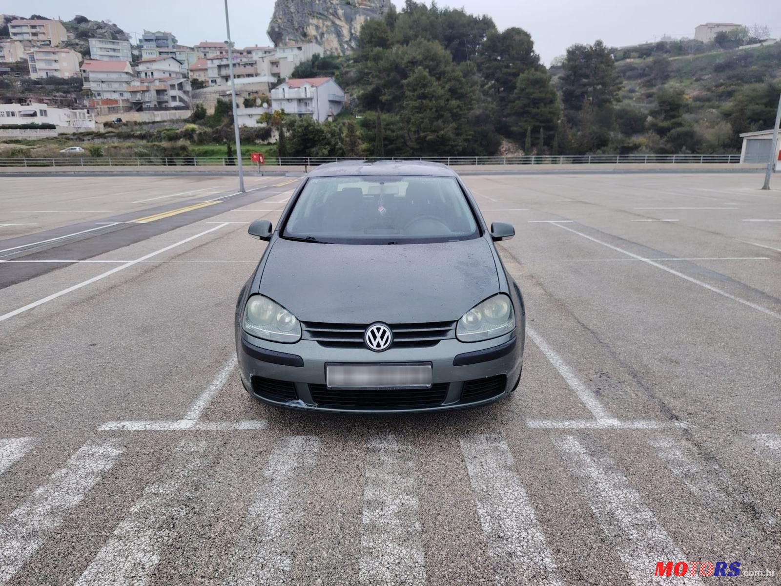 2004' Volkswagen Golf V 1,4 photo #1