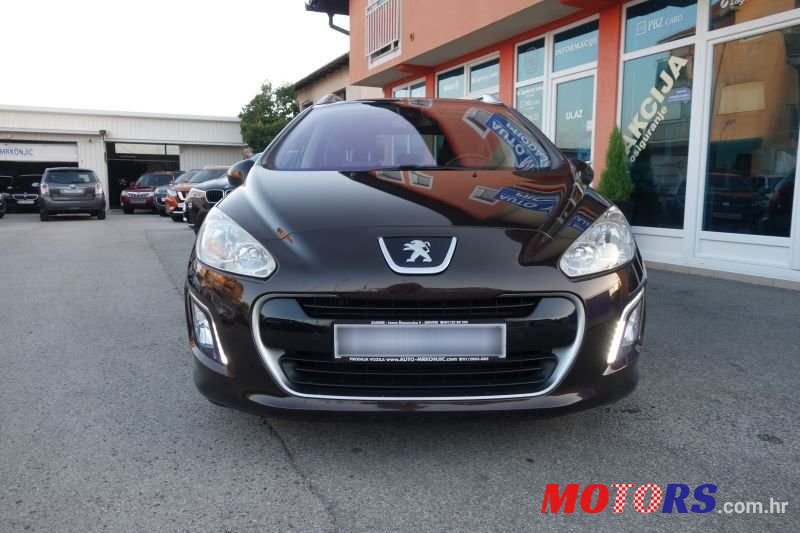 2012' Peugeot 308 Sw photo #2