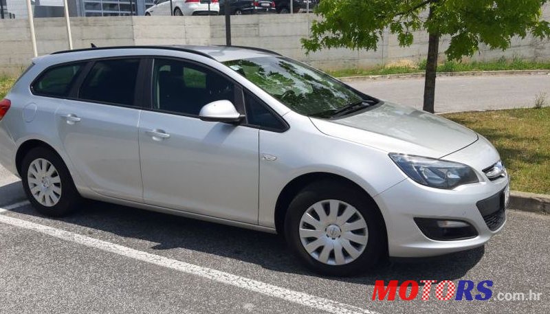 2015' Opel Astra Karavan photo #1