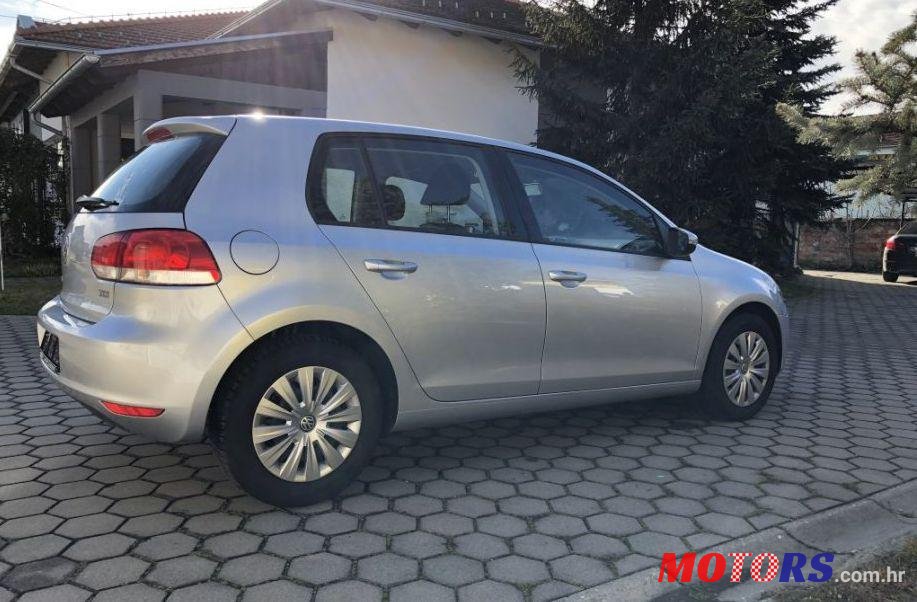 2009' Volkswagen Golf VI 1,6 Tdi photo #1