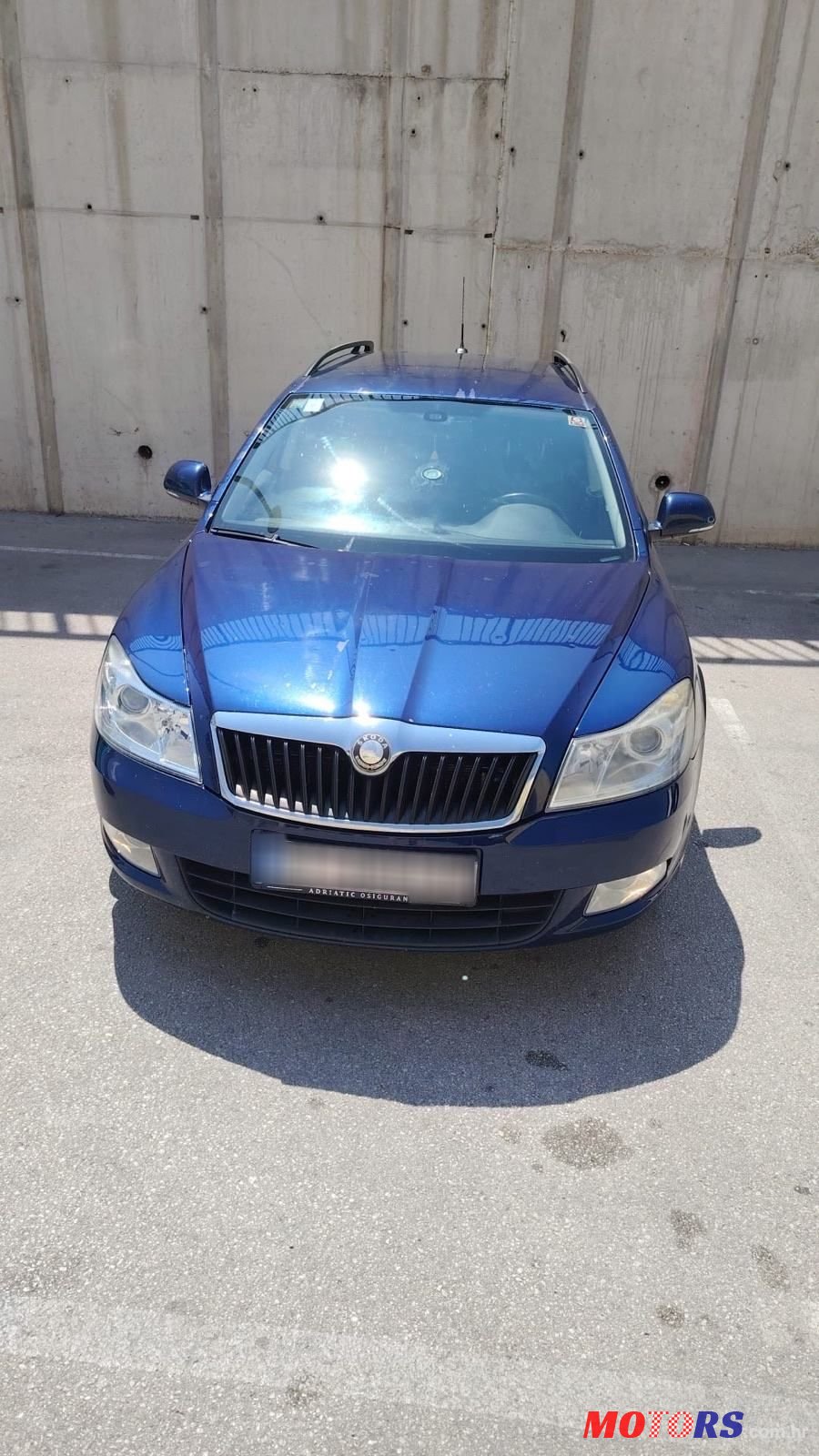 2011' Skoda Octavia 1,6 Tdi photo #2