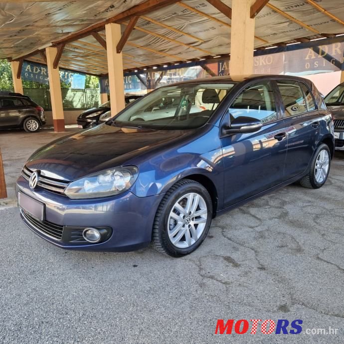 2011' Volkswagen Golf VI 1,6 Tdi photo #2