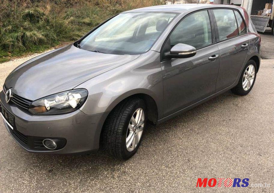 2011' Volkswagen Golf VI 1,6 Tdi photo #1