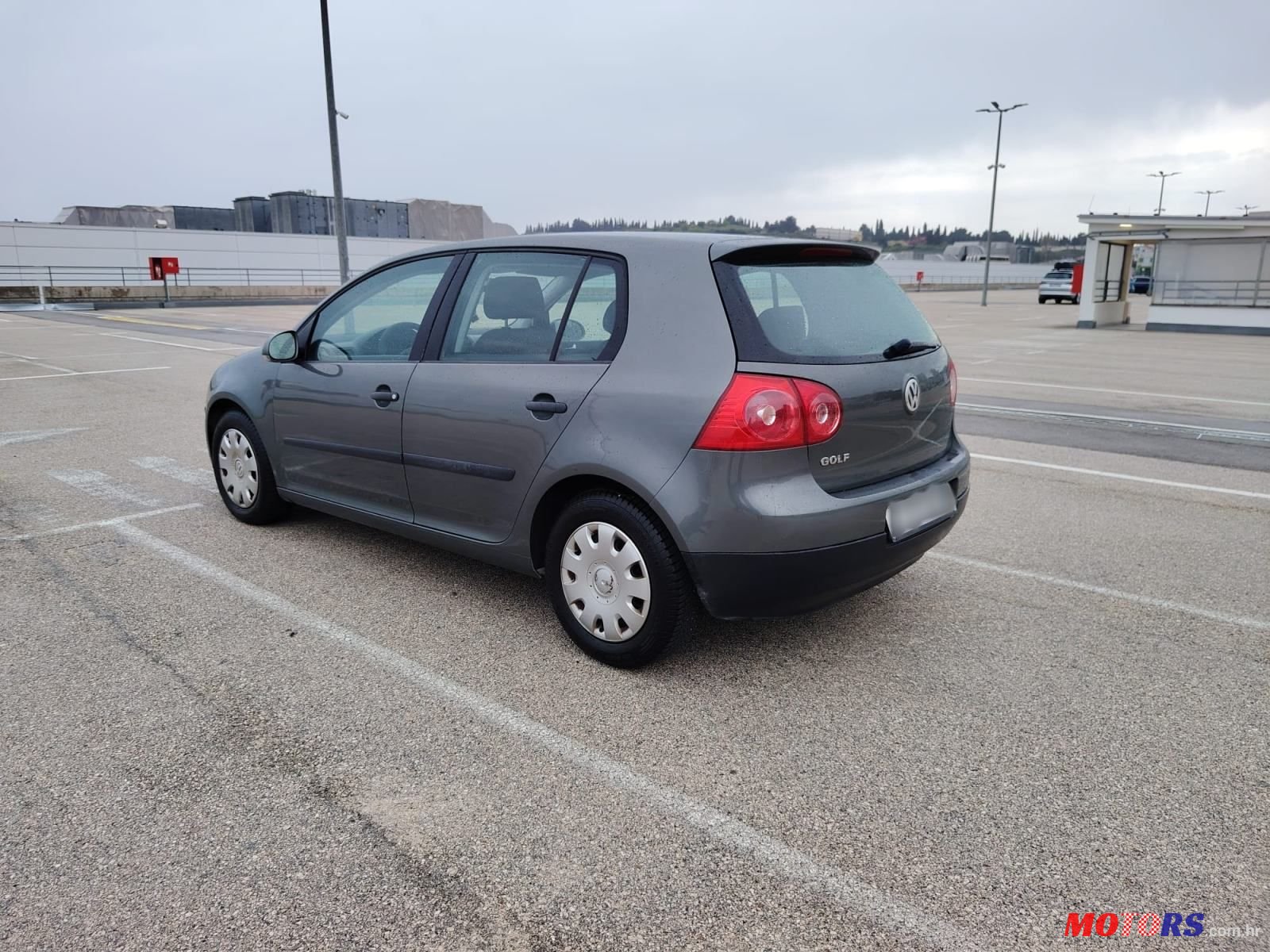 2004' Volkswagen Golf V 1,4 photo #4