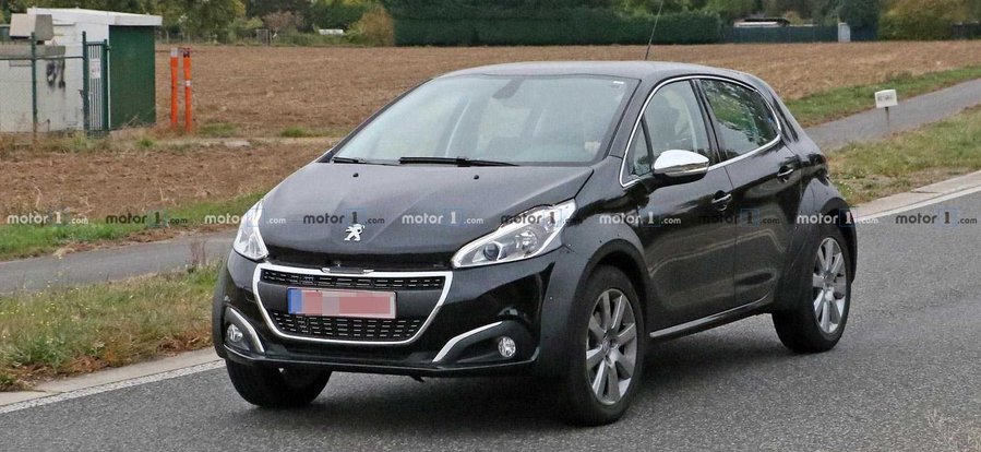 Peugeot's Tiny SUV Spied Trying To Hide Under 208 Body