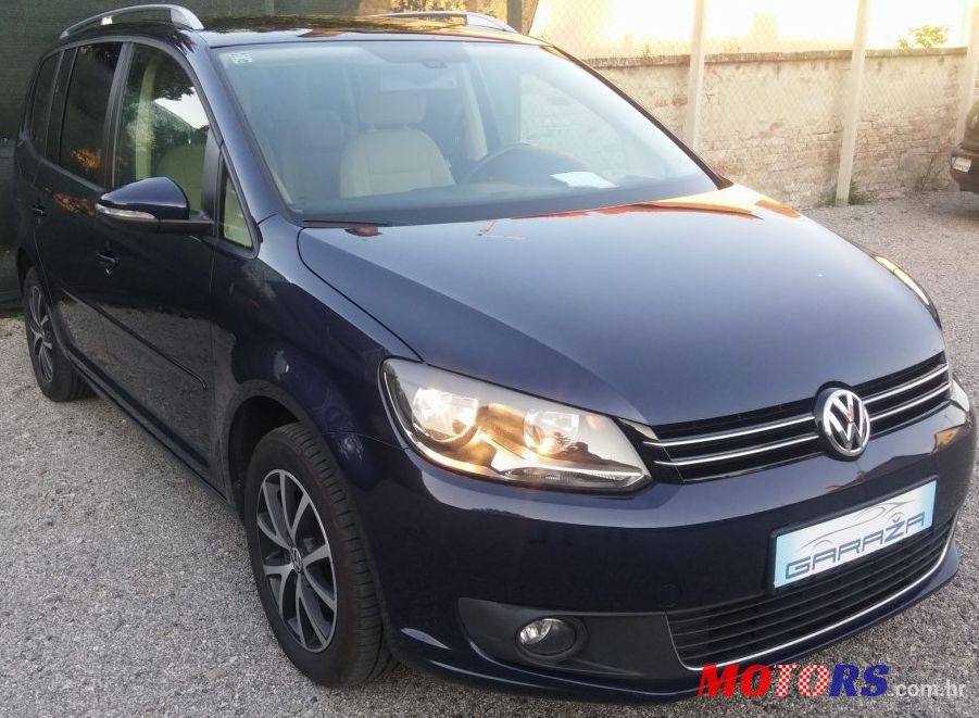 2014' Volkswagen Touran photo #2