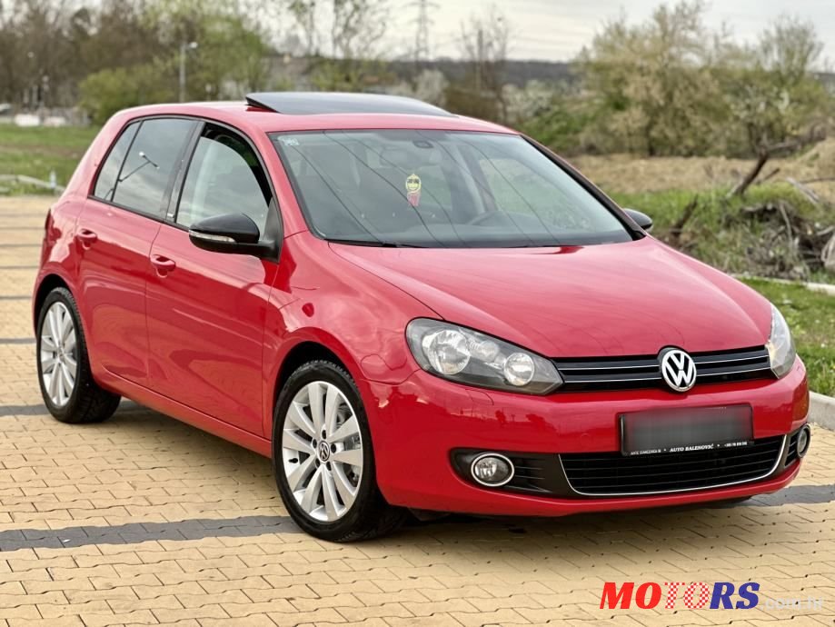 2012' Volkswagen Golf VI 1,6 Tdi Style photo #1