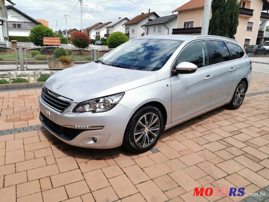 2015' Peugeot 308 Sw photo #1